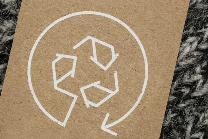 Recycling symbol på en etiket