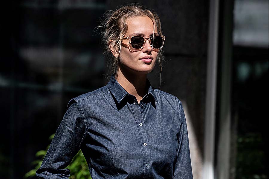 Woman in cowboy blue shirt