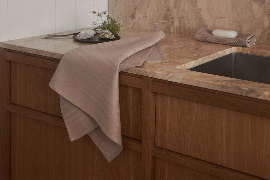 A Georg Jensen Damask teatowel next to a sink