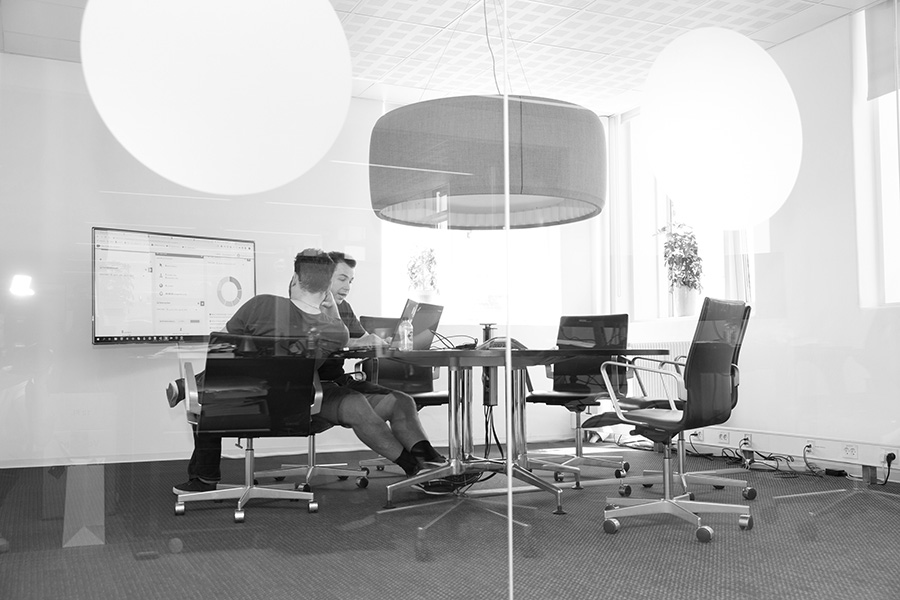 Meeting in room - Alpha Solutions